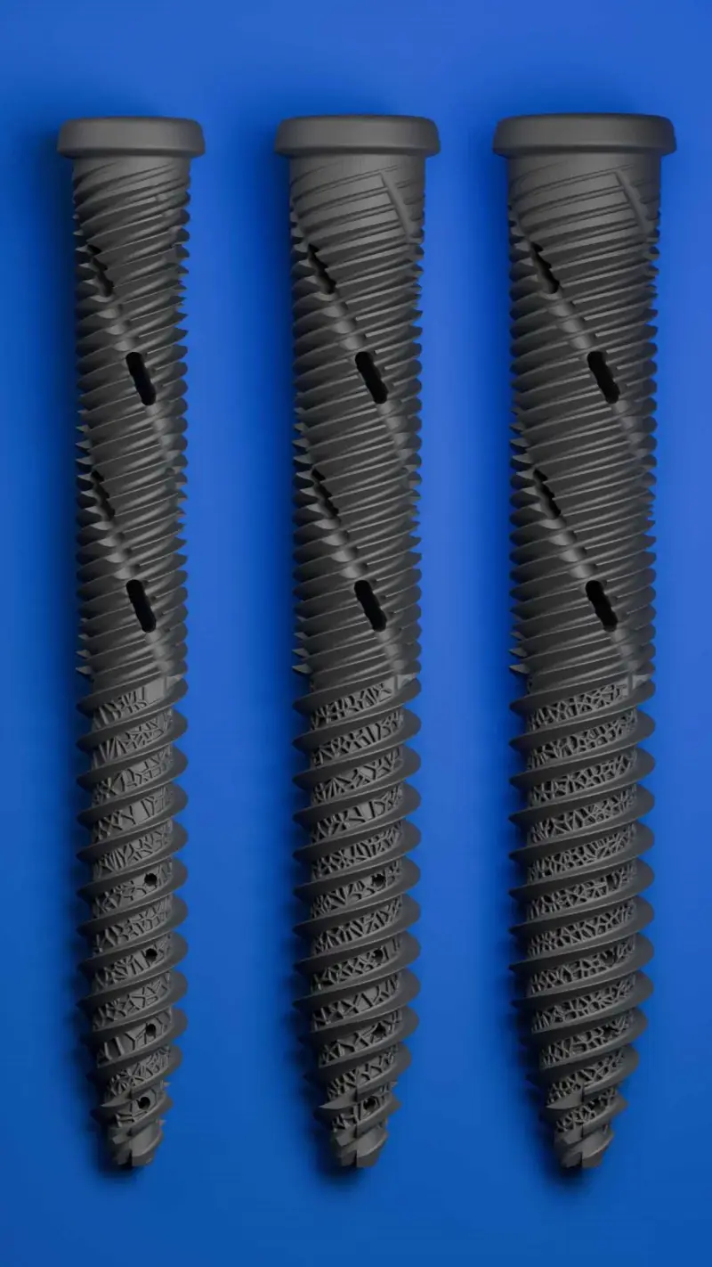 Three 3D printed titanium bone screws with lattice features